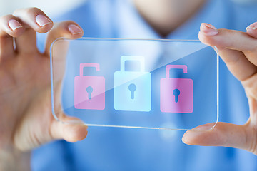 Image showing close up of woman with transparent smartphone