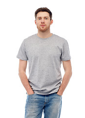 Image showing young man in gray t-shirt and jeans