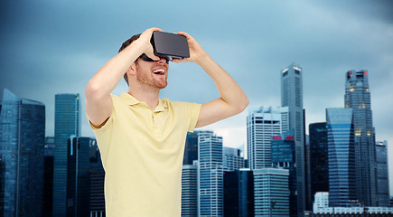 Image showing happy man in virtual reality headset or 3d glasses