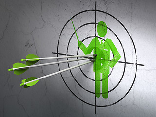 Image showing Studying concept: arrows in Teacher target on wall background