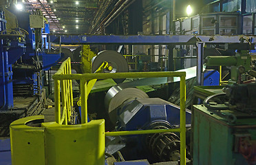 Image showing machine for rolling steel coil 