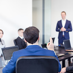 Image showing Colleague asking question to business team leader.