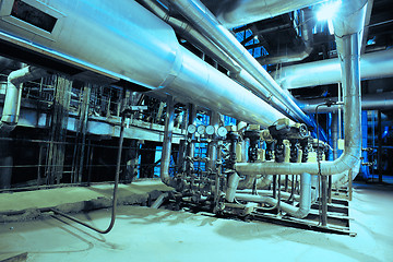 Image showing Equipment, cables and piping as found inside of a modern industr