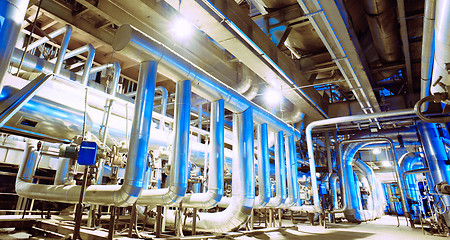 Image showing Equipment, cables and piping as found inside of a modern industr