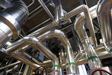 Image showing Equipment, cables and piping as found inside of a modern industr