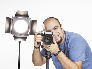 Image showing professional photographer with photographic equipment