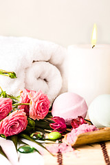 Image showing Spa setting with pink roses and aroma oil, vintage style 