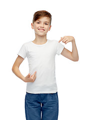 Image showing happy boy pointing finger to his white t-shirt