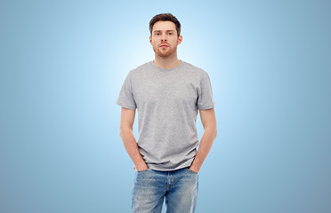 Image showing young man in gray t-shirt and jeans