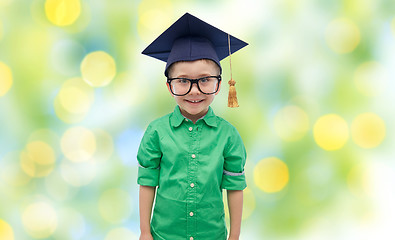 Image showing happy boy in bachelor hat or mortarboard