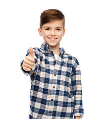 Image showing smiling boy in checkered shirt showing thumbs up