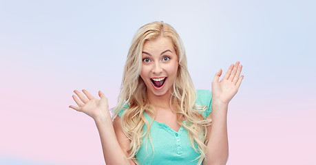 Image showing surprised smiling young woman or teenage girl