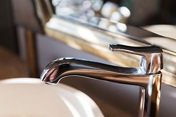 Image showing close up of bath tap or faucet at bathroom