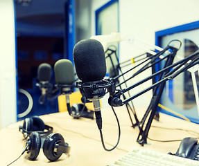 Image showing microphone at recording studio or radio station
