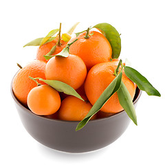 Image showing Tangerines on ceramic brown  bowl 