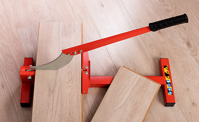 Image showing Red tool for cutting laminate