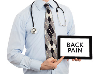 Image showing Doctor holding tablet - Back pain