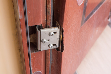 Image showing Torn metal hinged doors cheap