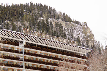 Image showing Dombay, Russia - February 7, 2015: The top part of the facade of the hotel \