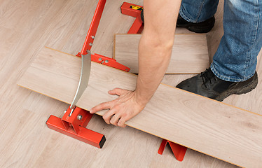 Image showing Red tool for cutting laminate