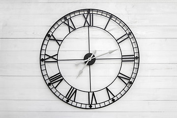 Image showing Black clock on white background