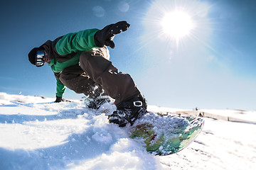 Image showing Snowboard freerider in the mountains