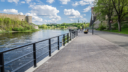 Image showing Narva River embankment with vacationers people and the border of Russia and the European Union