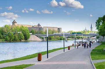 Image showing Narva River embankment with vacationers people and the border of Russia and the European Union