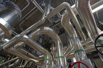 Image showing Equipment, cables and piping as found inside of a modern industr