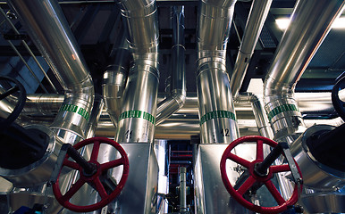 Image showing Equipment, cables and piping as found inside of a modern industr