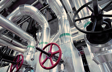 Image showing Equipment, cables and piping as found inside of a modern industr