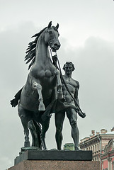 Image showing Sculpture horseman with a horse.