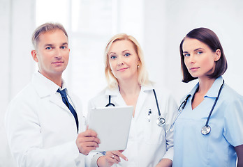 Image showing doctors looking at tablet pc