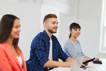 Image showing happy creative team or students working at office