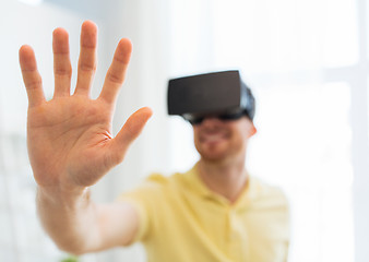 Image showing young man in virtual reality headset or 3d glasses