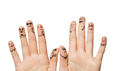 Image showing close up of hands and fingers with smiley faces