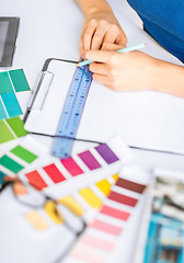 Image showing woman working with color samples for selection