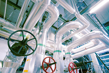 Image showing Equipment, cables and piping as found inside of a modern industr