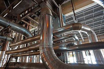 Image showing Equipment, cables and piping as found inside of a modern industr