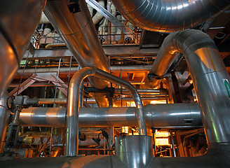 Image showing Equipment, cables and piping as found inside of a modern industr