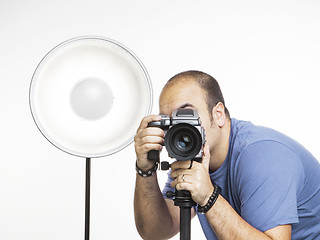 Image showing professional photographer with photographic equipment