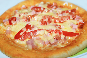 Image showing appetizing pizza with sausage and tomatoes