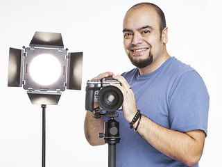 Image showing professional photographer with photographic equipment