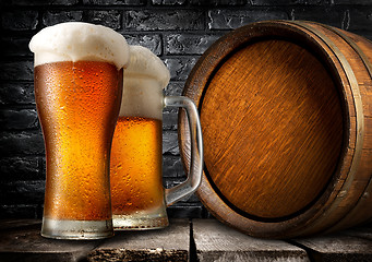 Image showing Wooden keg and beer