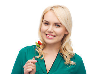 Image showing smiling young woman eating vegetable salad