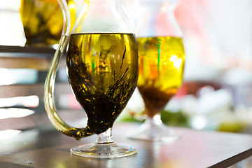 Image showing close up of glass jug with extra vergin olive oil