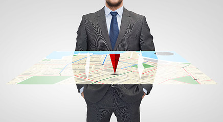 Image showing close up of businessman with gps navigator map