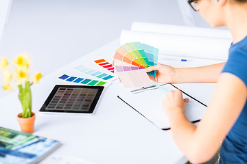 Image showing woman working with color samples for selection