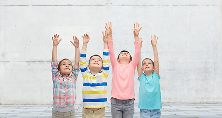 Image showing happy children celebrating victory on street