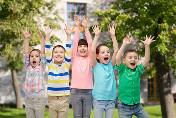 Image showing happy friends celebrating victory